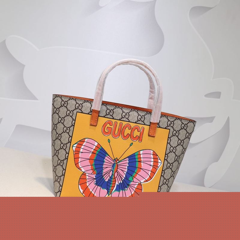 G*u*i shopping bags